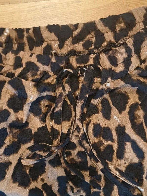Chino trousers brown synthetic fabric leopard print pattern 4XL size.