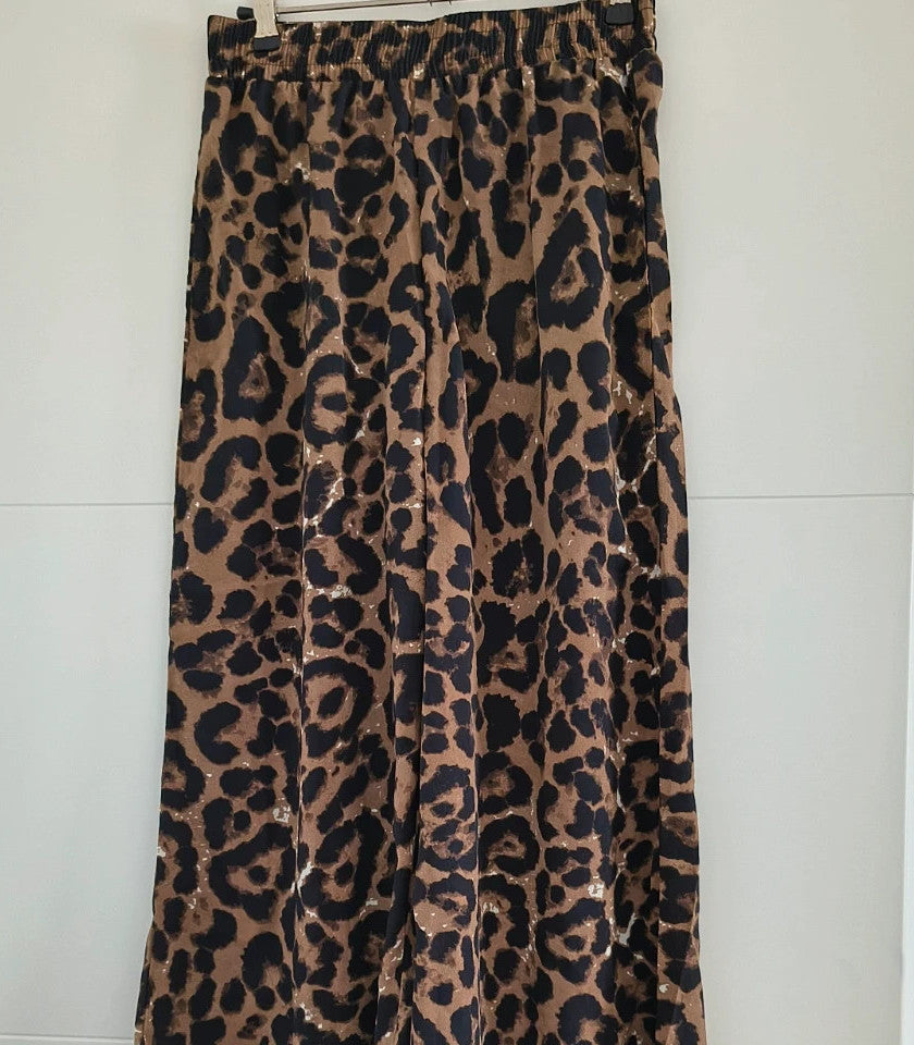 SheIn brown animal print flared pants synthetic material with leopard pattern.