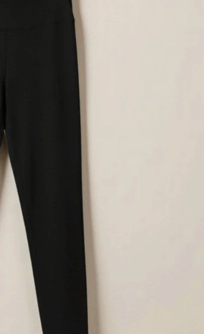 XXL black girls' leggings with ruched back for push-up effect, gently used.