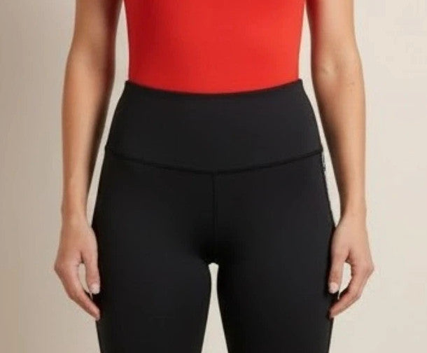 XXL black girls' leggings with ruched back for push-up effect, gently used.
