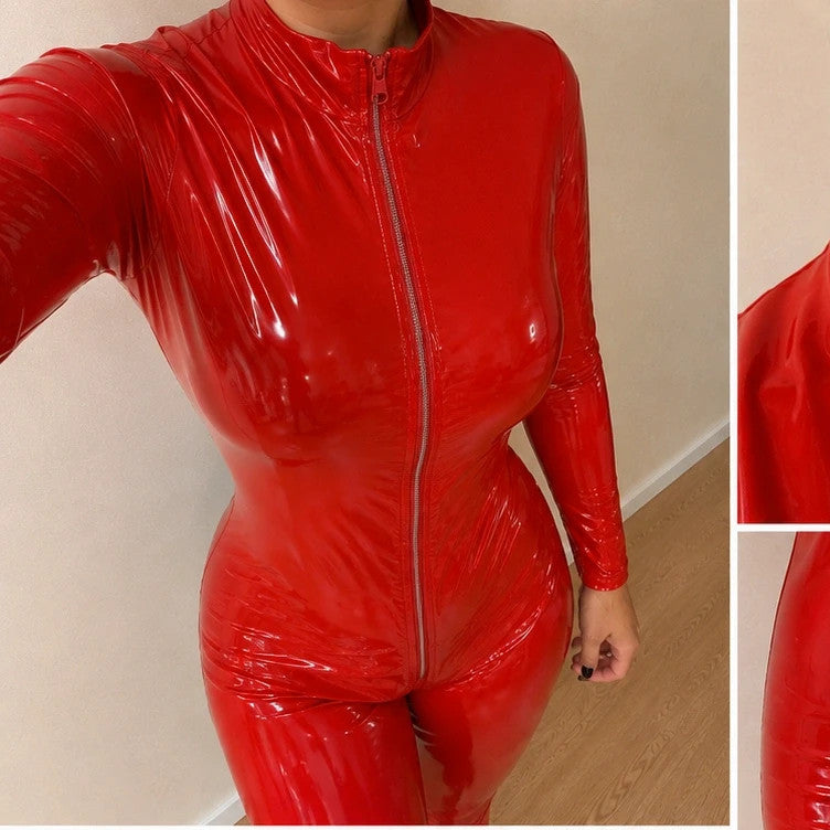 REI red wetlook overall with high collar and full zipper, figure-hugging fit.