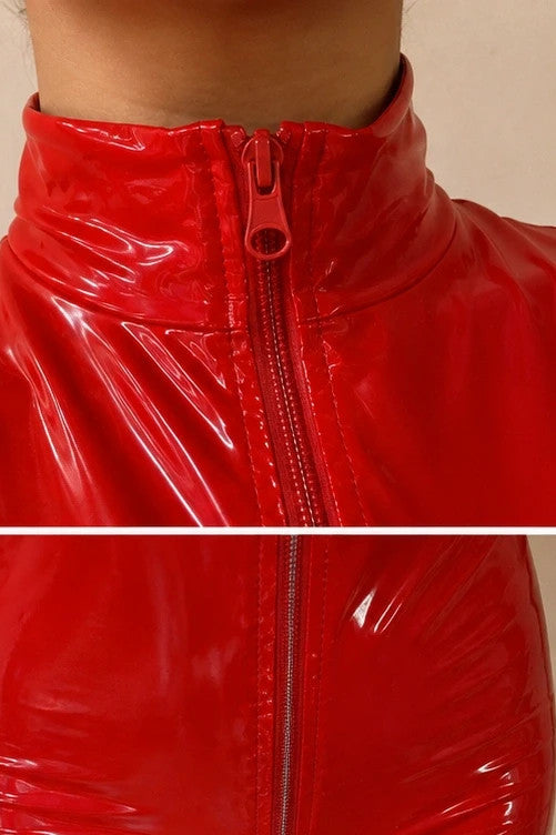 REI red wetlook overall with high collar and full zipper, figure-hugging fit.