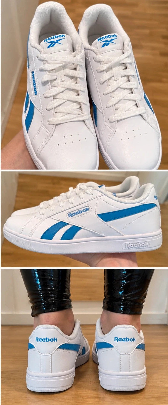 Reebok kids trainers white with blue details, classic lace-up design, synthetic material.