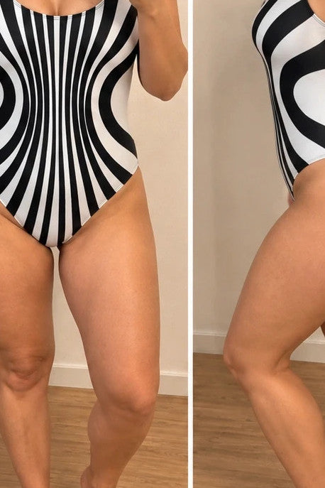 XXL one-piece swimsuit black and white striped optical print with deep neckline.
