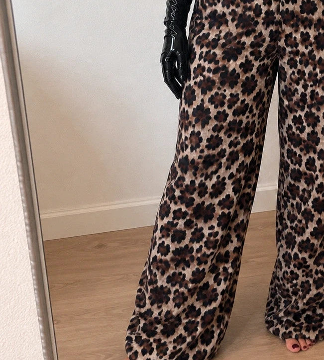 SheIn beige and brown leopard print jumpsuit with thin straps and wide legs.