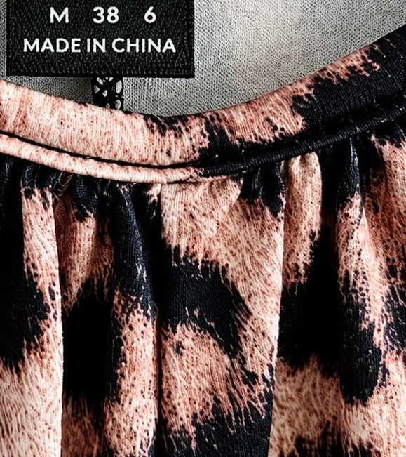 SheIn beige and brown leopard print jumpsuit with thin straps and wide legs.