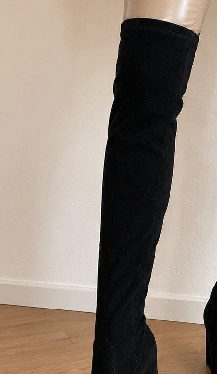 REI brown overknee slip-on boots in soft suede look with pointed toe and block heel.