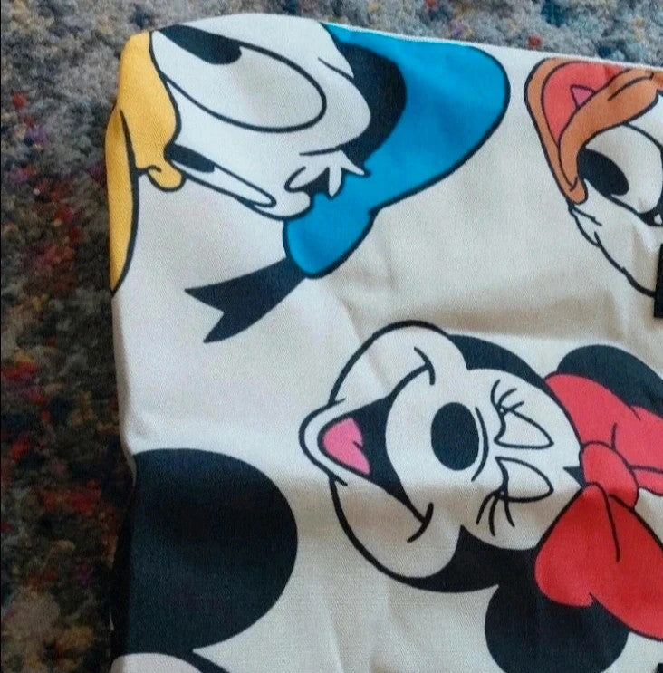 Kleine Tasche cream shopping tote with colorful cartoon comic print and sturdy handles.