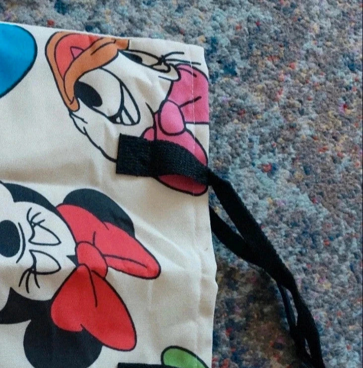 Kleine Tasche cream shopping tote with colorful cartoon comic print and sturdy handles.