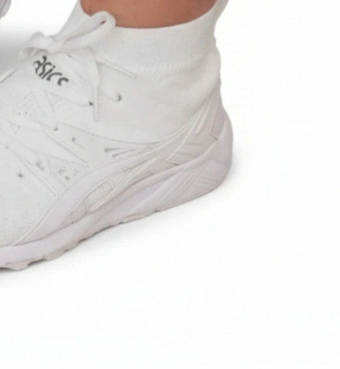 ASICS white trainers synthetic and textile material with classic design and logo.