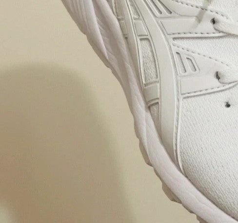 ASICS white trainers synthetic and textile material with classic design and logo.