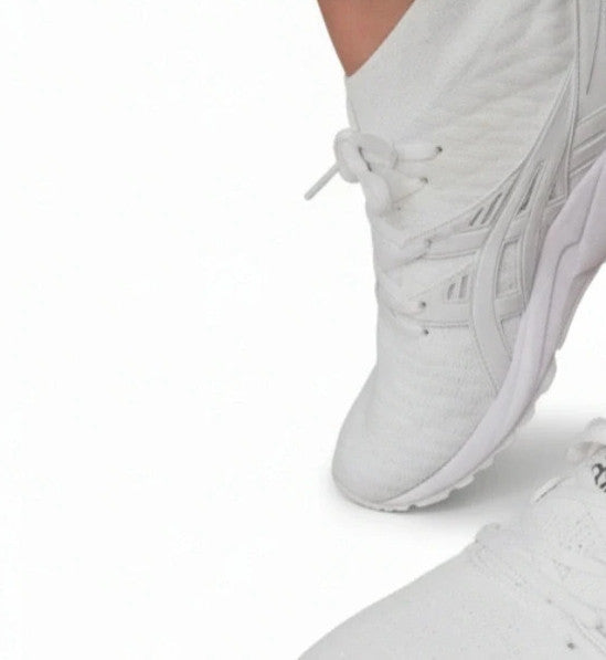 ASICS white trainers synthetic and textile material with classic design and logo.