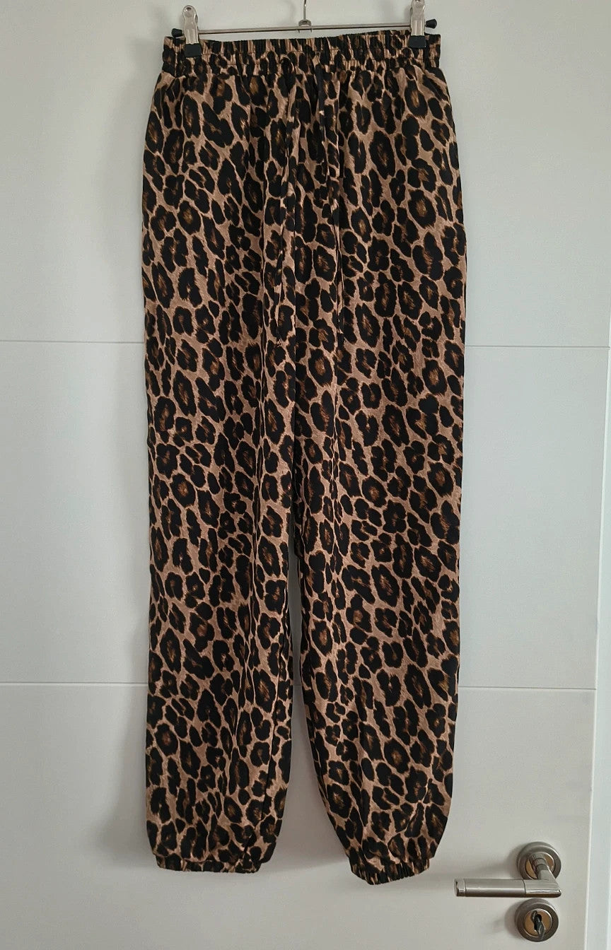 SheIn joggers black and brown leopard print synthetic material with elastic waistband.