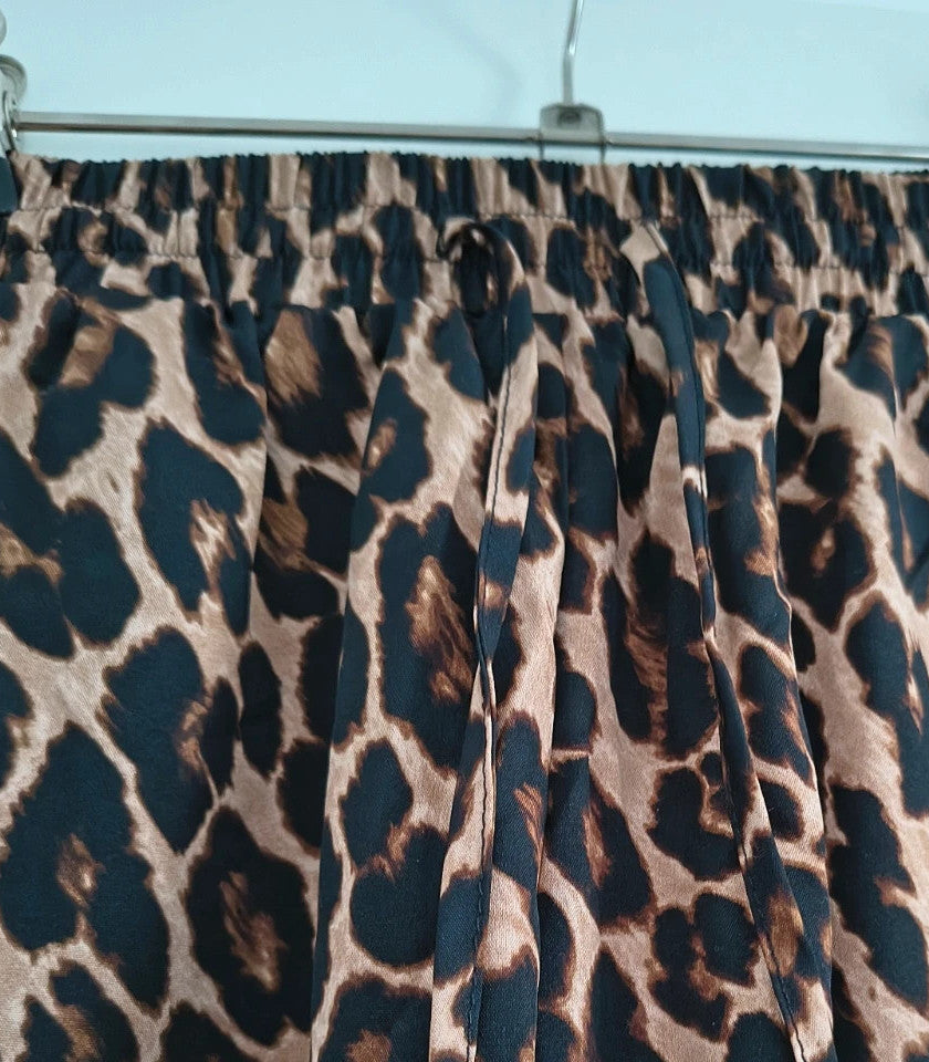 SheIn joggers black and brown leopard print synthetic material with elastic waistband.