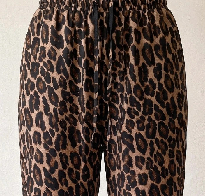 SheIn joggers black and brown leopard print synthetic material with elastic waistband.