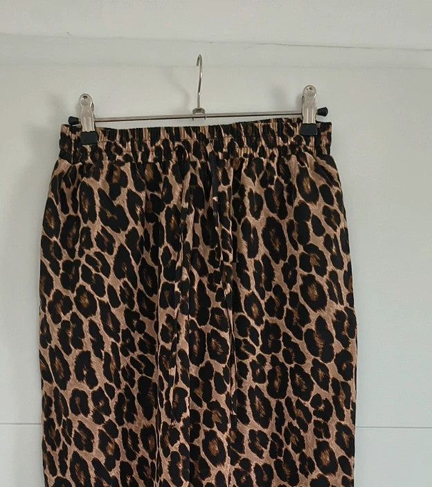 SheIn joggers black and brown leopard print synthetic material with elastic waistband.