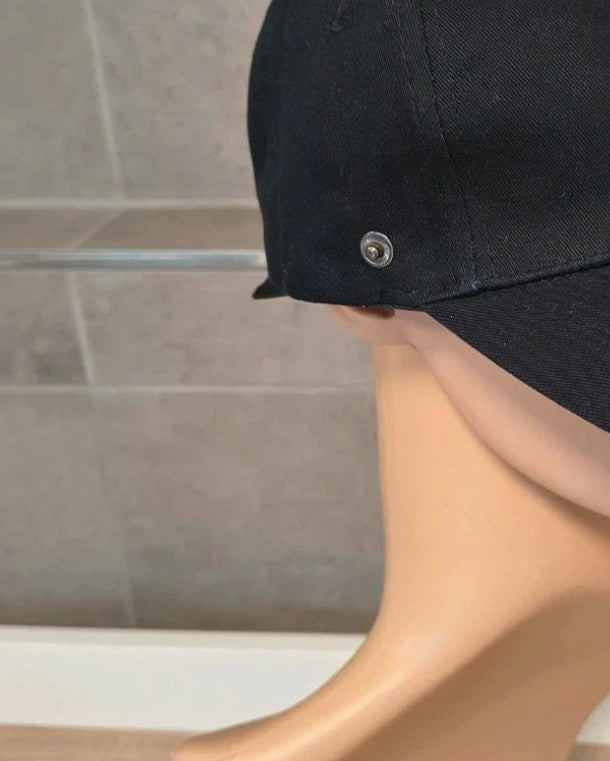ohne black hat with side snap buttons, minimalist design, adult size