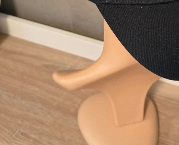 ohne black hat with side snap buttons, minimalist design, adult size
