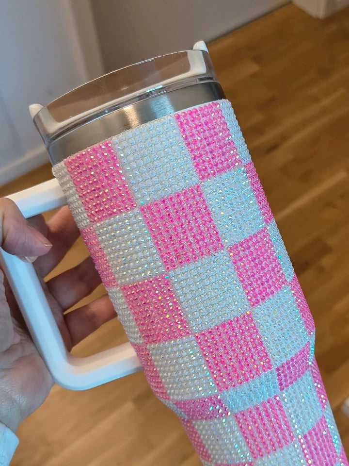 Grosser Isolierbecher pink and white stainless steel thermos with glitter finish.