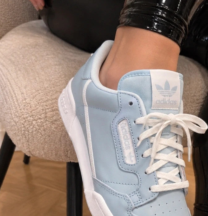 Adidas trainers blue with white details, classic look, subtle logo, size 40.