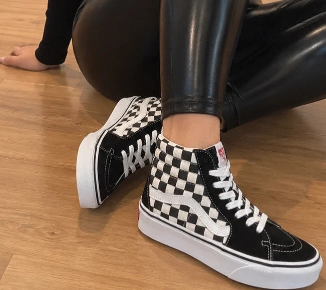 VANS trainers black and white checkered leather high-top with wedge heel and logo.