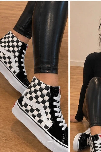 VANS trainers black and white checkered leather high-top with wedge heel and logo.
