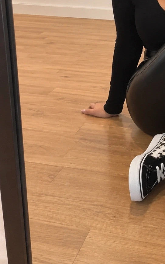 VANS trainers black and white checkered leather high-top with wedge heel and logo.