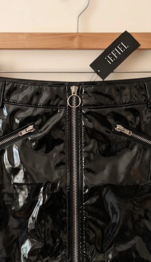 REI black mini skirt with zipper, synthetic latex look, size M, labeled as XL.