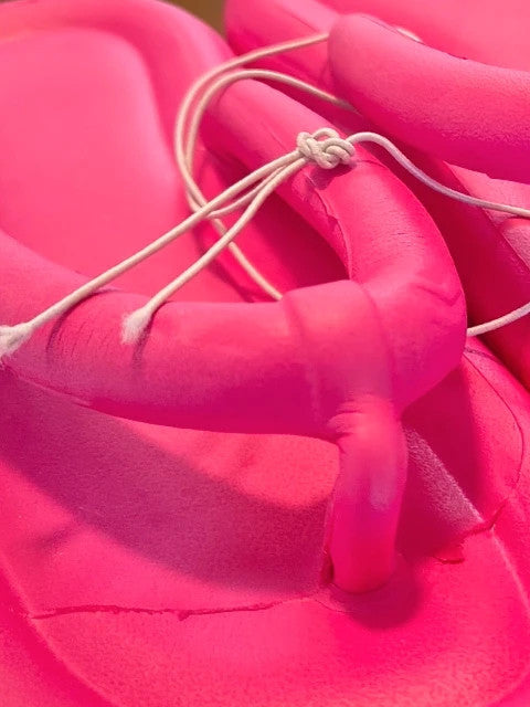 ALS pink slides synthetic material with toe separator design.