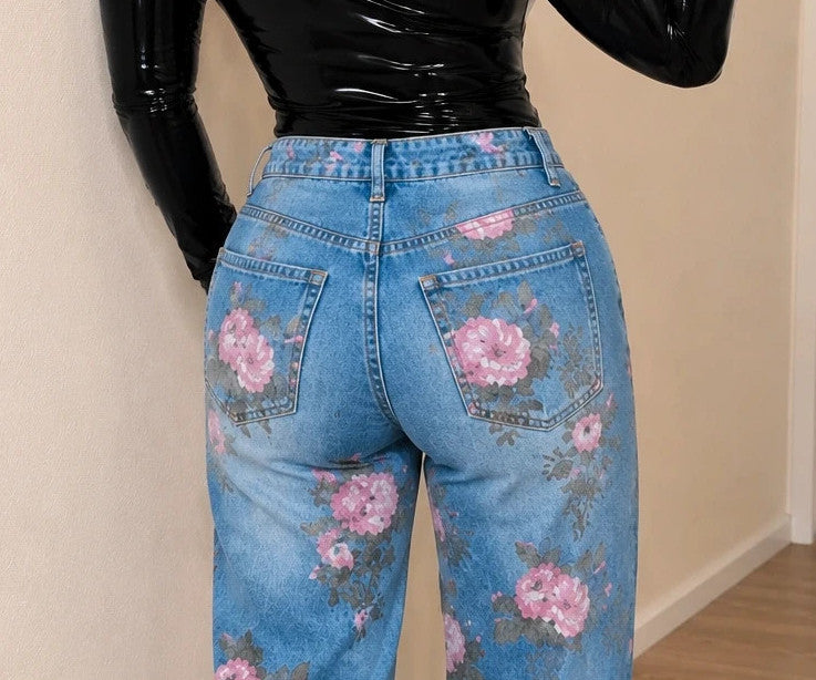 REI blue straight jeans with pink floral pattern and classic button closure.