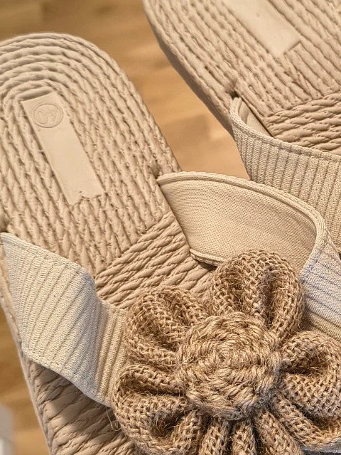 ALS beige slides synthetic material with subtle logo detailing.