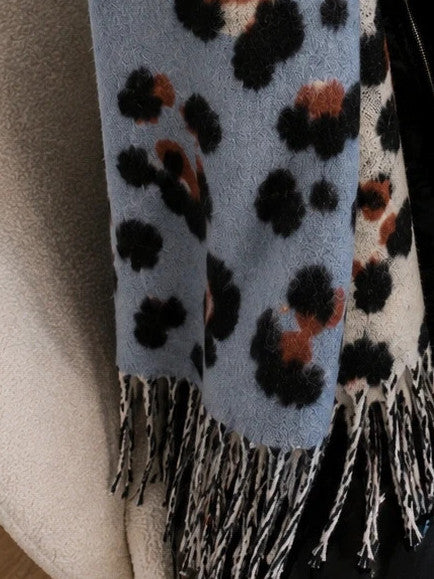 XXL multi shawl with leopard print in light blue, cream, and rust, featuring fringes.
