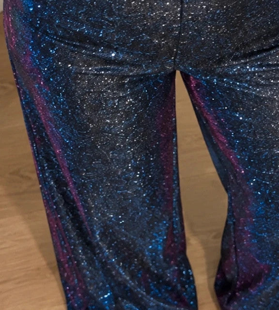 SheIn blue glitter flared pants high waist with color-changing effect and back zipper.