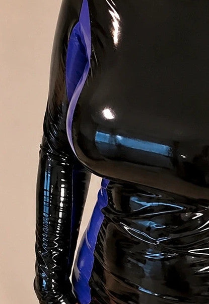 XXL black and purple bandage dress with glossy wetlook finish and long sleeves.