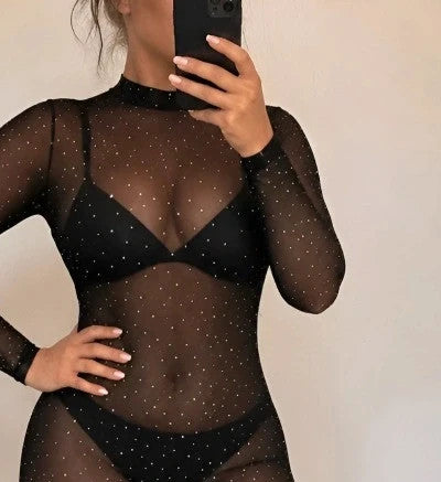 SheIn black jumpsuit sheer fabric with sparkling rhinestone details and long sleeves.