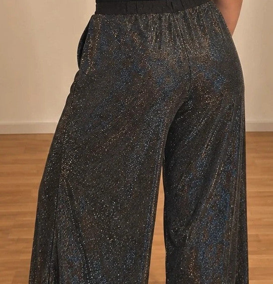 SheIn black and silver glitter flared pants with side slits and shimmering fabric.