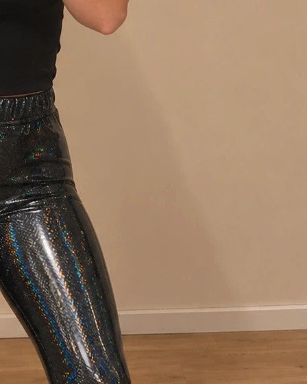 SheIn black leggings with holographic effect and shiny surface, size S.