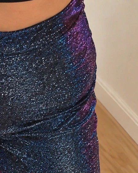 SheIn blue glitter flared pants with color-changing effect and high waist design.
