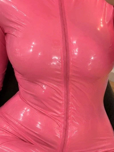 Che pink jumpsuit with glossy finish, long sleeves, and body-hugging fit.