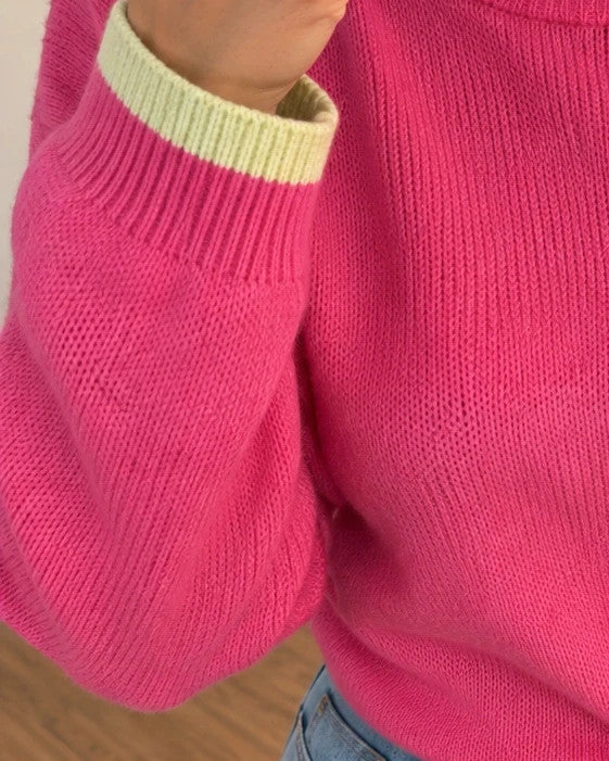 ONLY pink oversized pullover with drawstring, soft material, and contrasting sleeve accents.