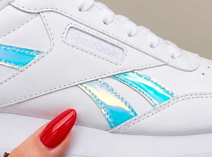 Reebok white trainers hologram details, synthetic material, classic logo design.