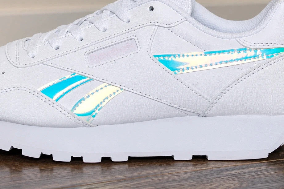 Reebok white trainers hologram details, synthetic material, classic logo design.