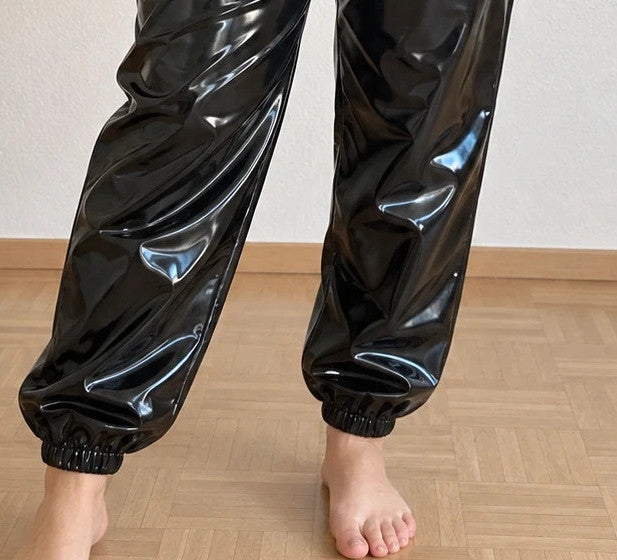 Che black joggers shiny wetlook finish with elastic waistband and cuffs.