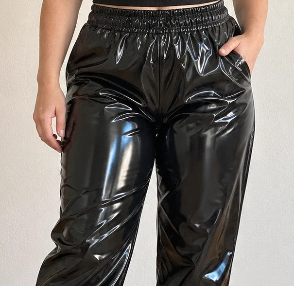 Che black joggers shiny wetlook finish with elastic waistband and cuffs.