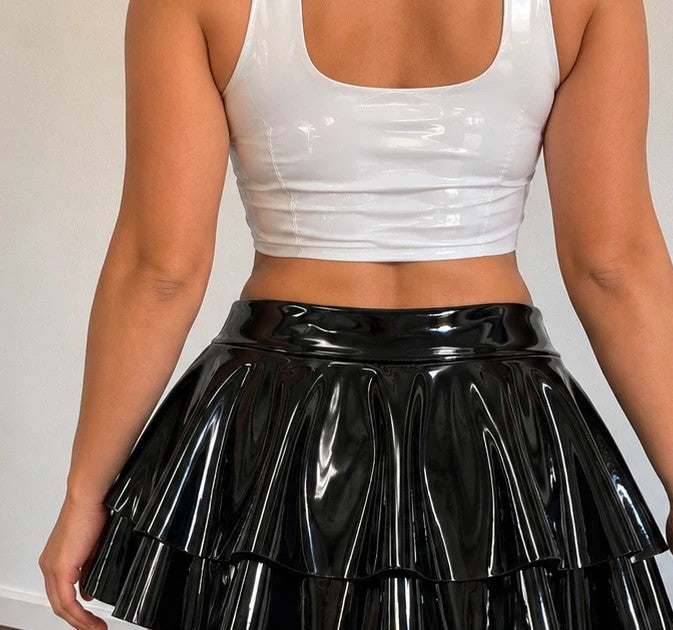 XXL black wetlook ruffled skirt with shiny finish and wide waistband.