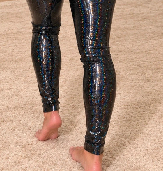 SheIn black leggings with holographic effect, figure-hugging fit, shimmering color change.