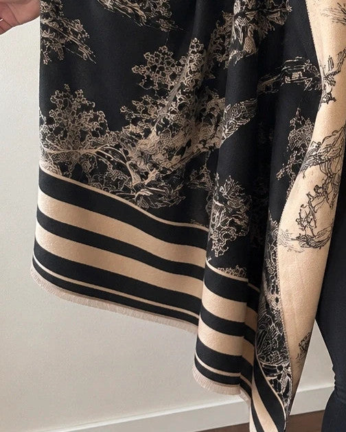 XXL beige and black reversible shawl with beautiful pattern and soft polyester material.