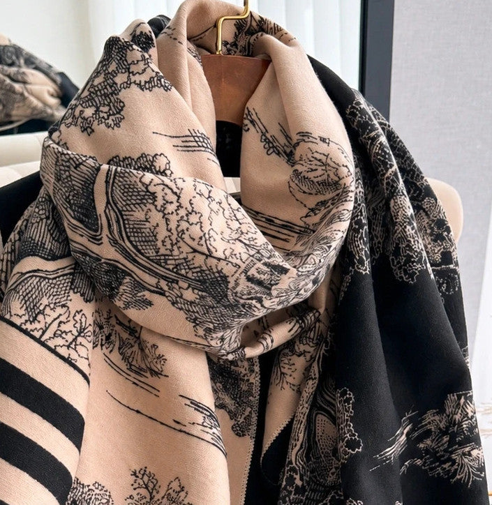XXL beige and black reversible shawl with beautiful pattern and soft polyester material.