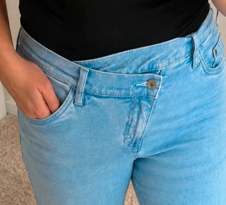 Rainbow blue straight jeans with unique overlapping waistband and two-button closure.