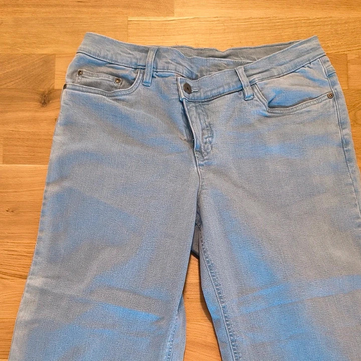 Rainbow blue straight jeans with unique overlapping waistband and two-button closure.
